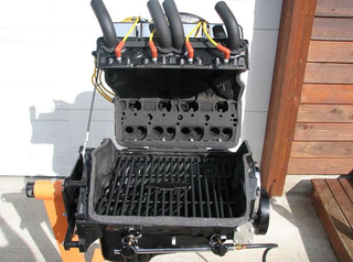 Illustration for article titled BBQ Grill Made of a V8 Engine Block